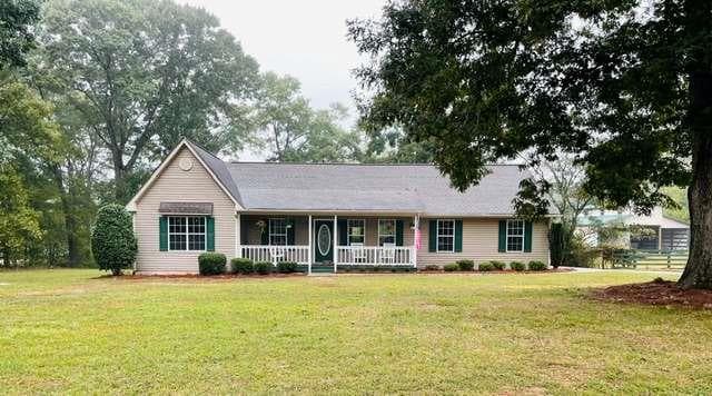 3 bedroom, 2 bathroom, 1,815 sq ft single family residence for sale at 1138 John Deere Road, Monroe, GA 30656