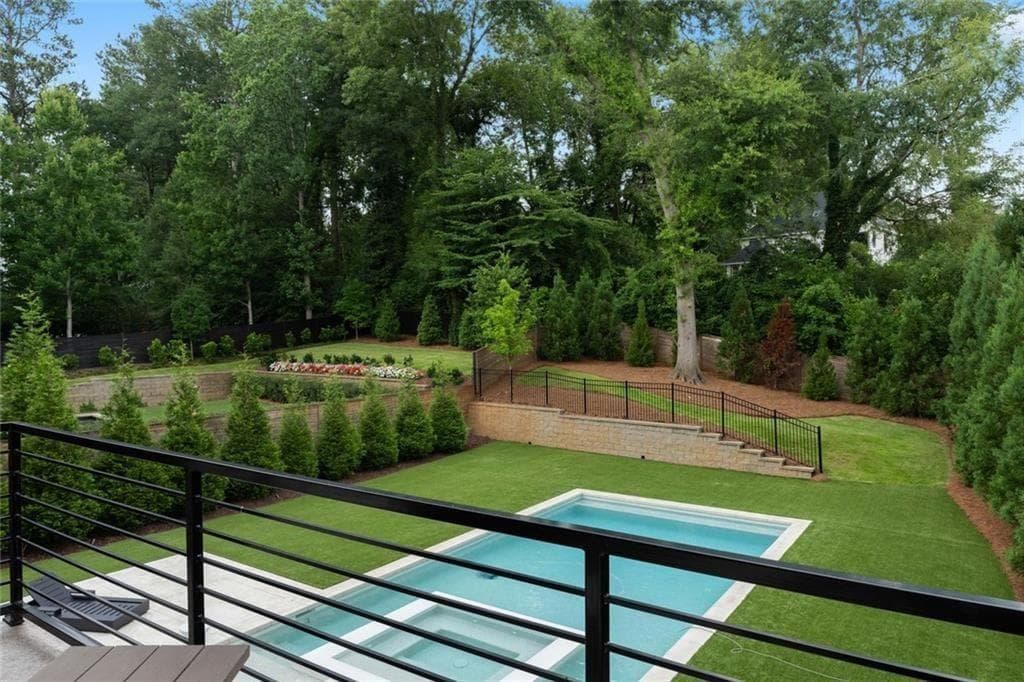 6 bedroom, 5 bathroom, 12,000 sq ft single family residence for sale at 4063 Rickenbacker Drive, Atlanta, GA 30342 — photo 4