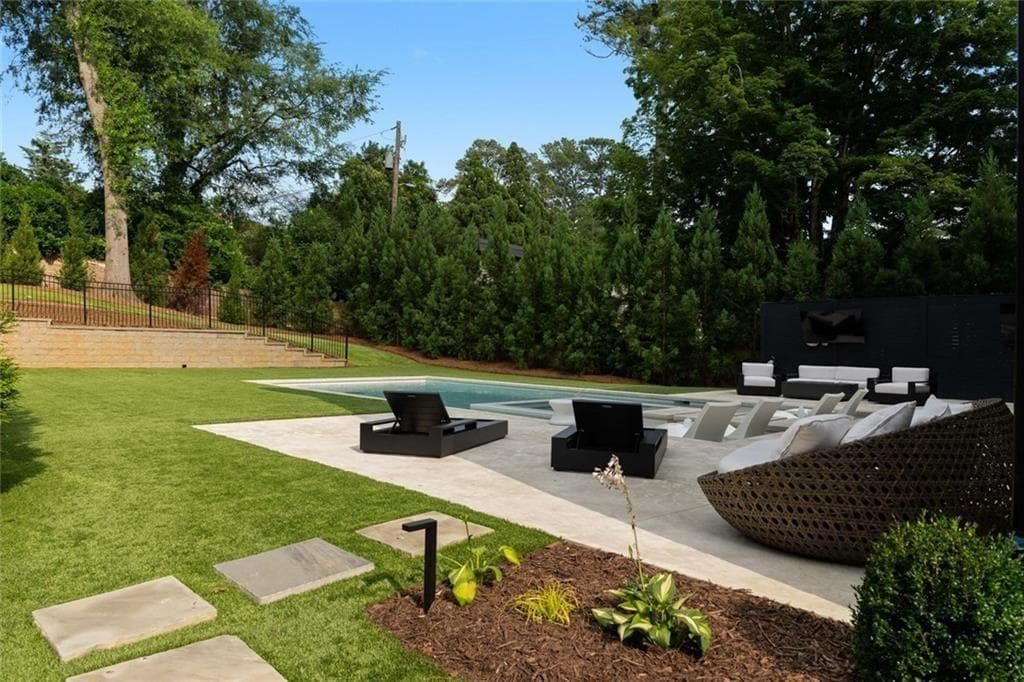 6 bedroom, 5 bathroom, 12,000 sq ft single family residence for sale at 4063 Rickenbacker Drive, Atlanta, GA 30342 — photo 5