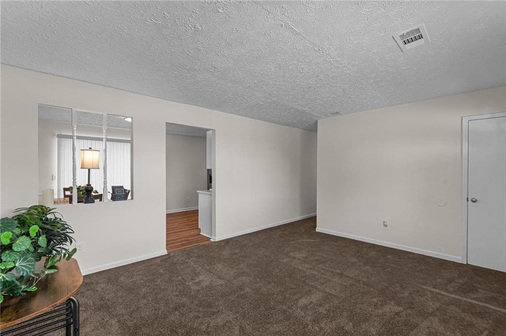 3 bedroom, 2 bathroom, 1,116 sq ft single family residence for sale at 1832 Mcdonough Road, Hampton, GA 30228 — photo 2