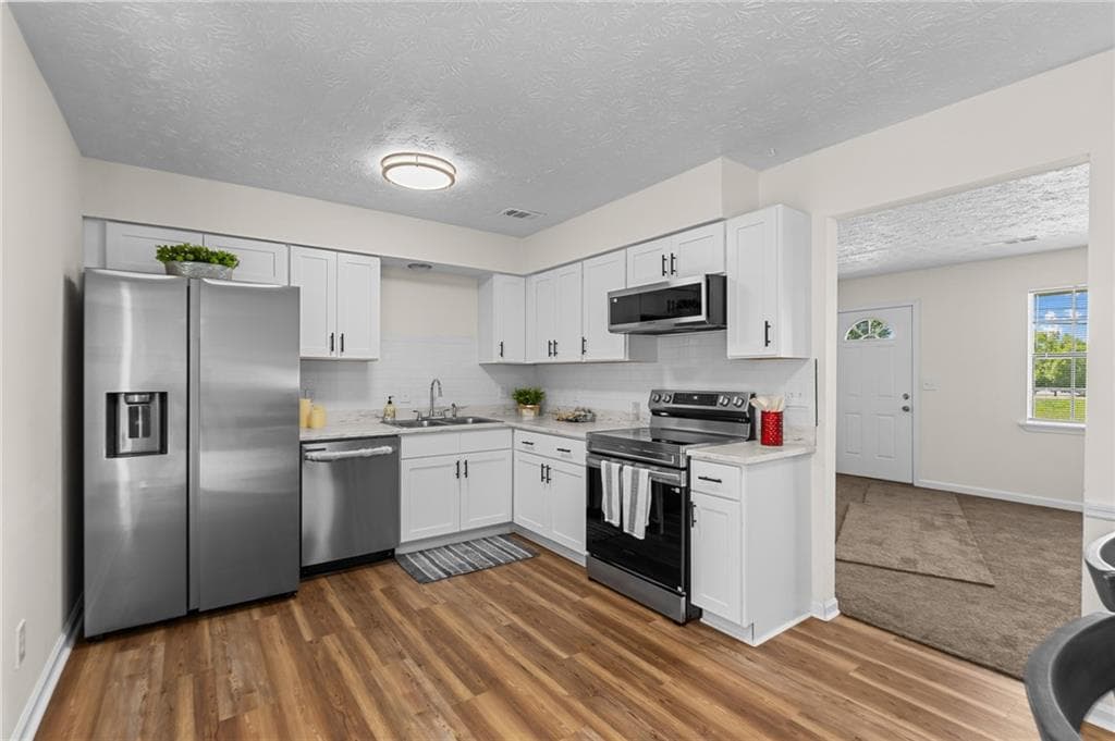 3 bedroom, 2 bathroom, 1,116 sq ft single family residence for sale at 1832 Mcdonough Road, Hampton, GA 30228 — photo 6