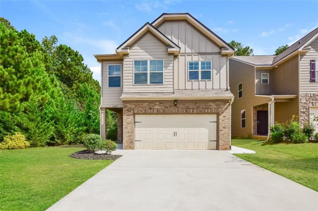 4 bedroom, 3 bathroom, 2,172 sq ft single family residence for sale at 5097 Rapahoe Trail, Atlanta, GA 30349 — photo 1 of 18