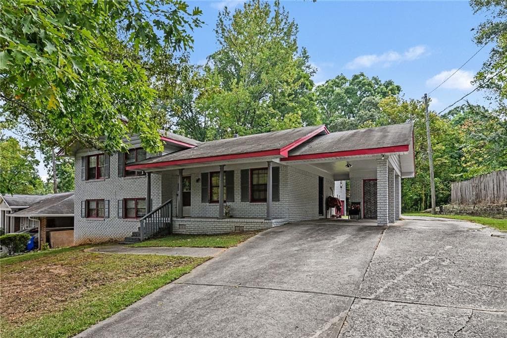4 bedroom, 3 bathroom, 1,728 sq ft single family residence for sale at 3634 Telstar Drive, Ellenwood, GA 30294 — photo 2