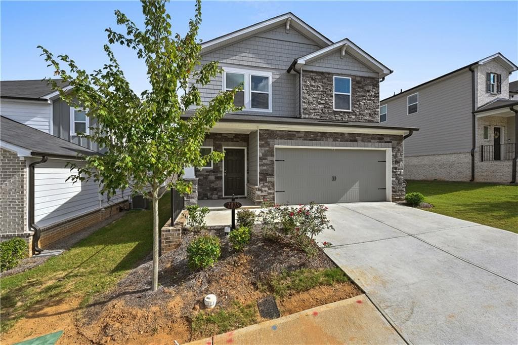 5 bedroom, 3 bathroom, 2,352 sq ft single family residence for sale at 2073 Baron Manor Drive, Lawrenceville, GA 30044 — photo 3