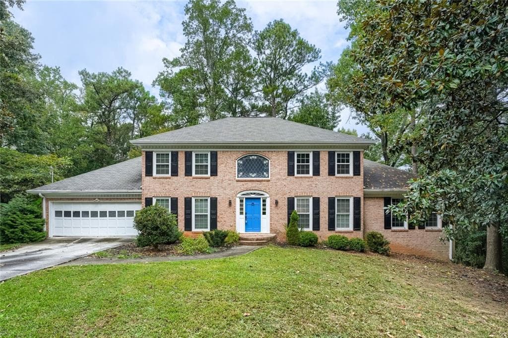 4 bedroom, 3 bathroom, 5,327 sq ft single family residence for sale at 2562 River Knoll Drive, Lilburn, GA 30047
