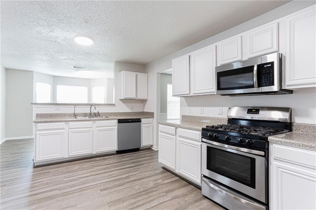 4 bedroom, 3 bathroom, 2,684 sq ft single family residence for sale at 1947 Cutters Mill Way, Lithonia, GA 30058 — photo 8