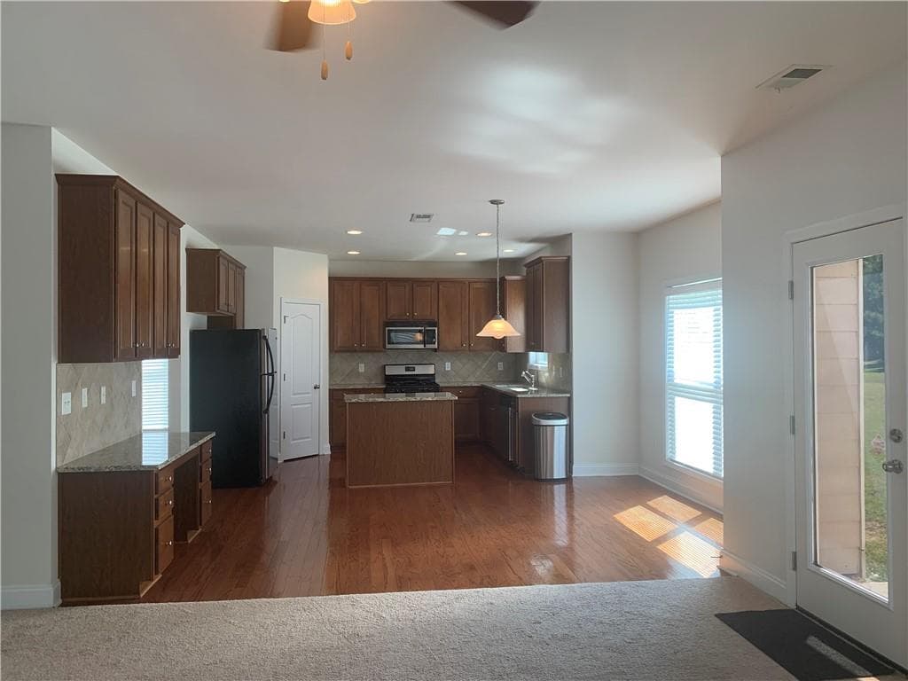 5 bedroom, 3 bathroom, 3,250 sq ft single family residence for sale at 2118 Water Mill Court, Buford, GA 30519 — photo 7
