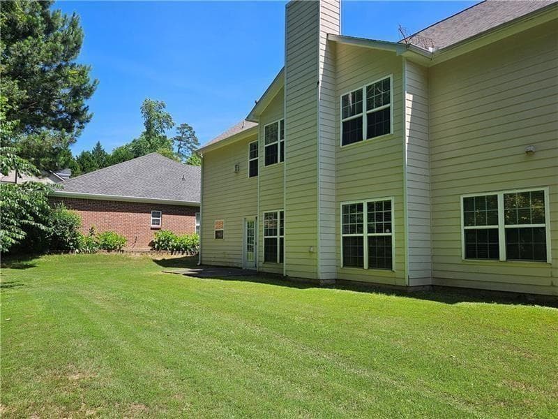 5 bedroom, 4 bathroom, 3,035 sq ft single family residence for sale at 5580 Hastings Terrace, Alpharetta, GA 30005 — photo 3