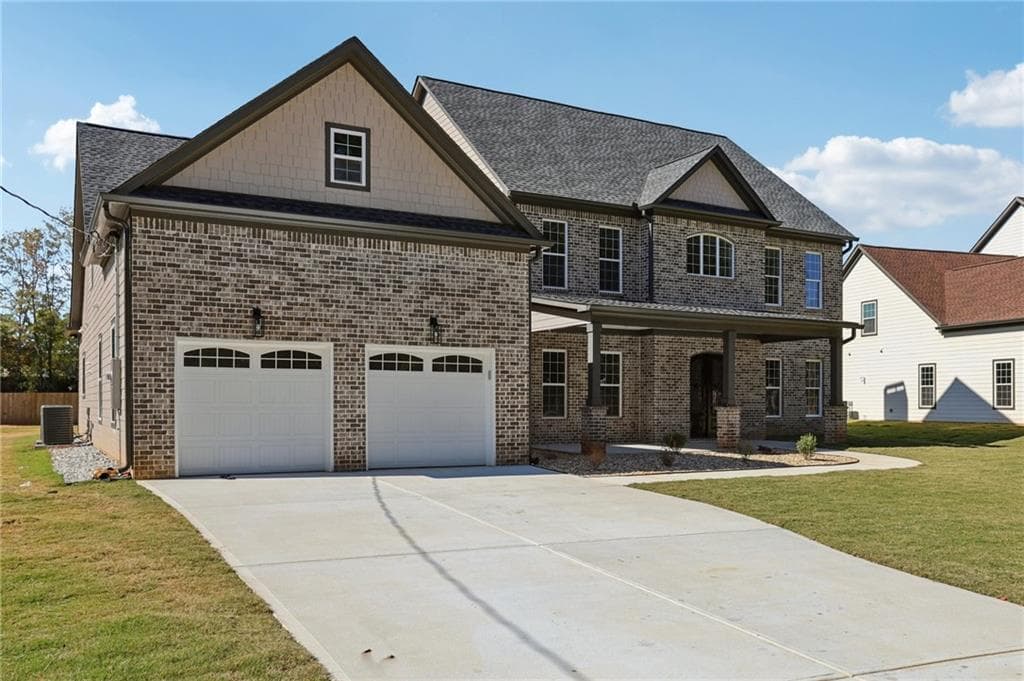 6 bedroom, 4 bathroom, 4,146 sq ft single family residence for sale at 1949 Pucketts Drive, Lilburn, GA 30047 — photo 2