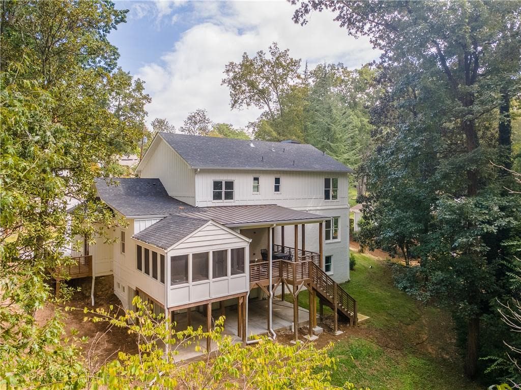 6 bedroom, 6 bathroom, 5,400 sq ft single family residence for sale at 6434 Cherry Tree Lane, Sandy Springs, GA 30328 — photo 2