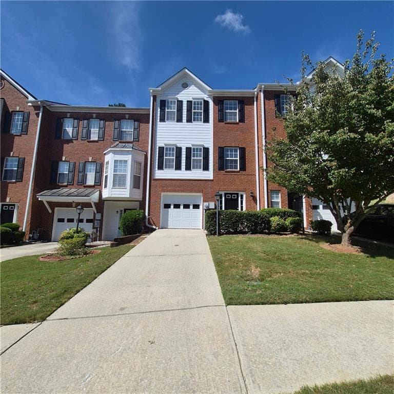 3 bedroom, 4 bathroom, 1,841 sq ft townhouse for sale at 2162 Mill Garden Run, Buford, GA 30519