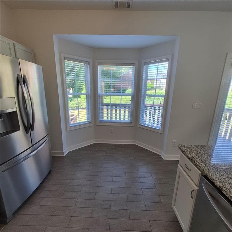 3 bedroom, 4 bathroom, 1,841 sq ft townhouse for sale at 2162 Mill Garden Run, Buford, GA 30519 — photo 8