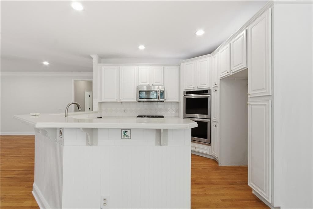 6 bedroom, 5 bathroom, 4,492 sq ft single family residence for sale at 2455 Millwater Crossing, Dacula, GA 30019 — photo 6