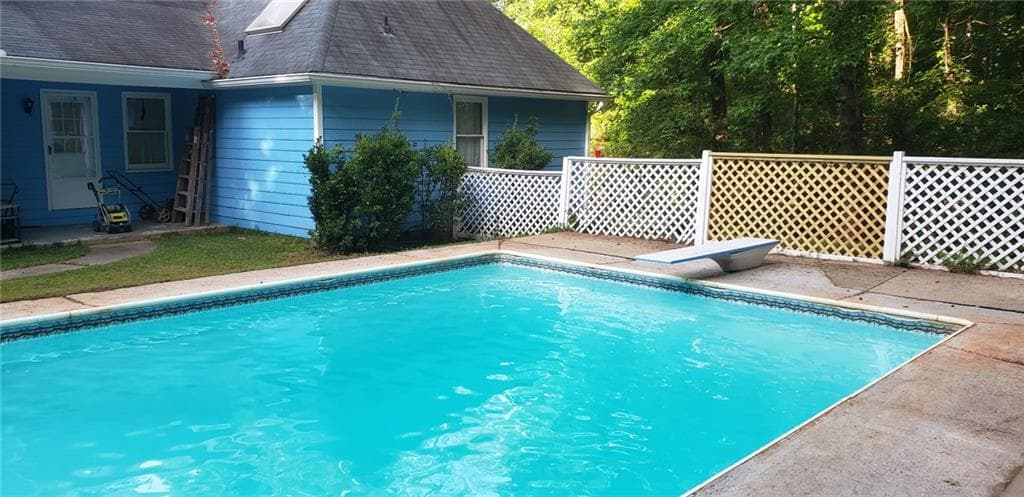 4 bedroom, 3 bathroom, 2,170 sq ft single family residence for sale at 1390 Kirkland Road, Covington, GA 30016 — photo 3