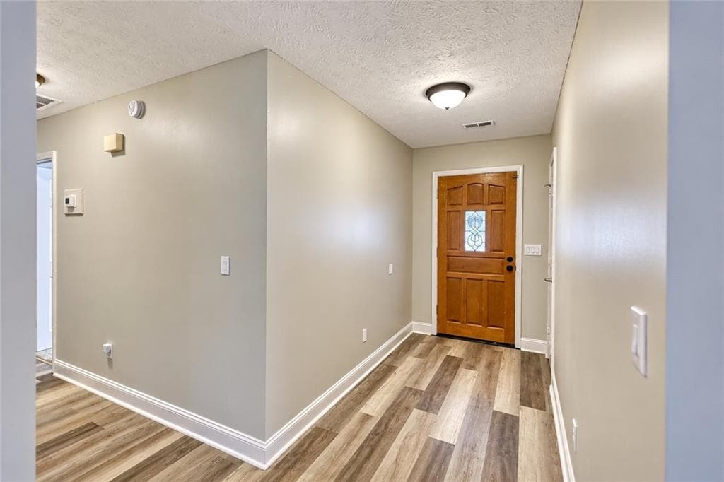 4 bedroom, 3 bathroom, 2,299 sq ft single family residence for sale at 4302 Derbyshire Trace, Conyers, GA 30094 — photo 3