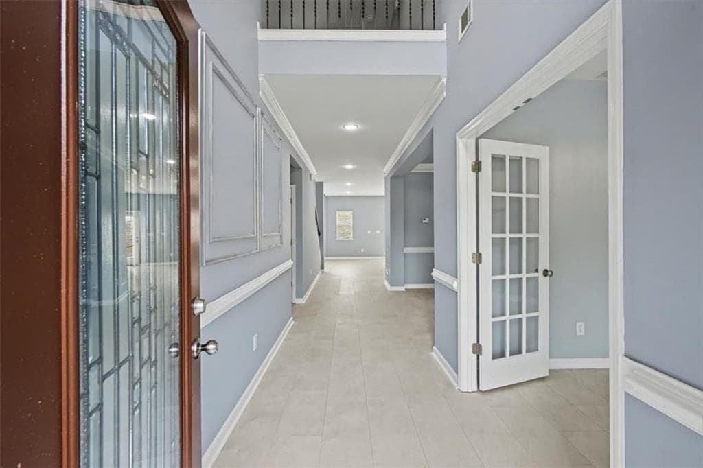 4 bedroom, 3 bathroom, 3,200 sq ft single family residence for sale at 6810 Rocking Horse Lane, Cumming, GA 30040 — photo 2