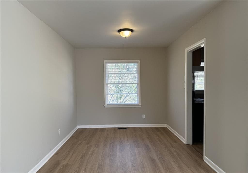 3 bedroom, 2 bathroom, 1,392 sq ft single family residence for sale at 10747 Thrasher Road, Jonesboro, GA 30238 — photo 2