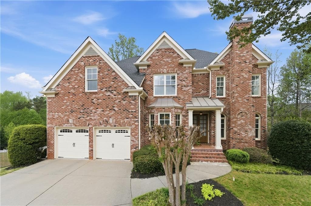 6 bedroom, 5 bathroom, 4,558 sq ft single family residence for sale at 3196 Nours Landing Circle, Duluth, GA 30097 — photo 1 of 39