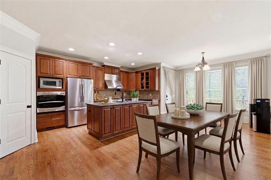 6 bedroom, 5 bathroom, 4,558 sq ft single family residence for sale at 3196 Nours Landing Circle, Duluth, GA 30097 — photo 8