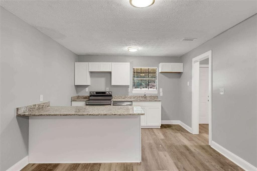 4 bedroom, 2 bathroom, 1,508 sq ft single family residence for sale at 1677 Liberty Valley, Decatur, GA 30032 — photo 4