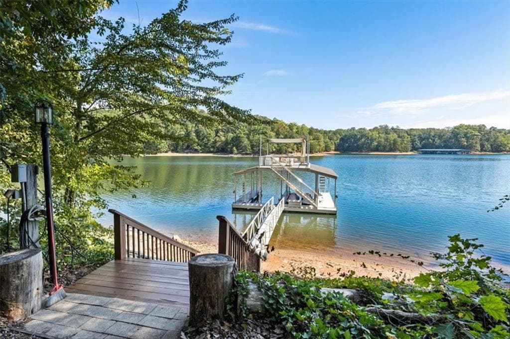 5 bedroom, 5 bathroom, 6,320 sq ft single family residence for sale at 5750 Cains Cove Road, Cumming, GA 30041 — photo 2