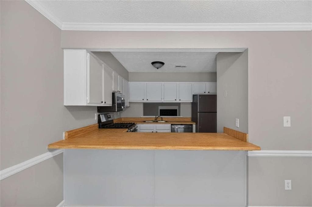 2 bedroom, 3 bathroom, 1,159 sq ft single family residence for sale at 791 Heritage Oaks Drive, Stone Mountain, GA 30088 — photo 6