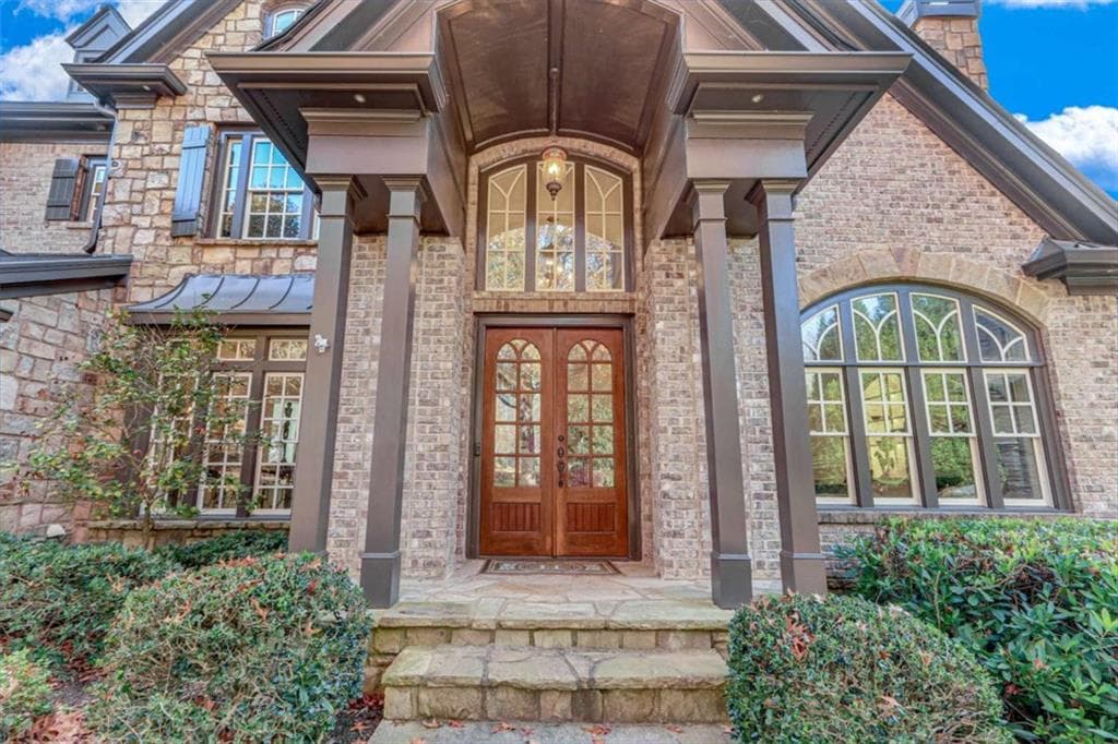 5 bedroom, 9 bathroom, 9,095 sq ft single family residence for sale at 6226 Random Winds Bluff, Gainesville, GA 30506 — photo 5
