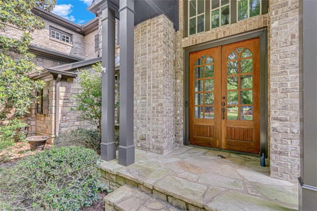 5 bedroom, 9 bathroom, 9,095 sq ft single family residence for sale at 6226 Random Winds Bluff, Gainesville, GA 30506 — photo 6