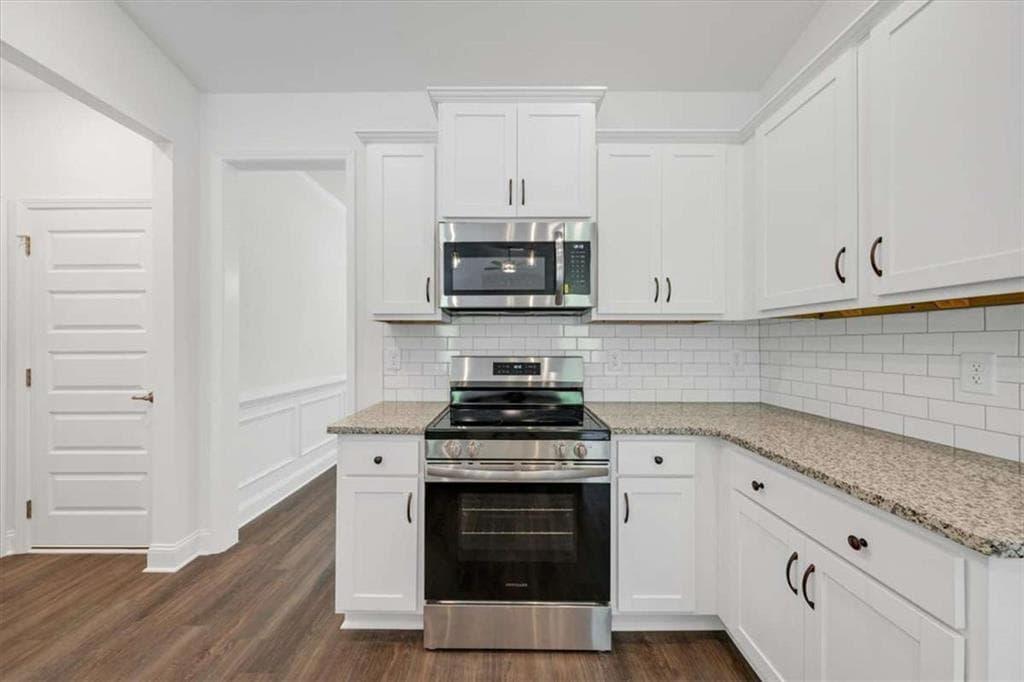 4 bedroom, 2 bathroom, 2,100 sq ft single family residence for sale at 305 Angela Avenue, Bowdon, GA 30108 — photo 4