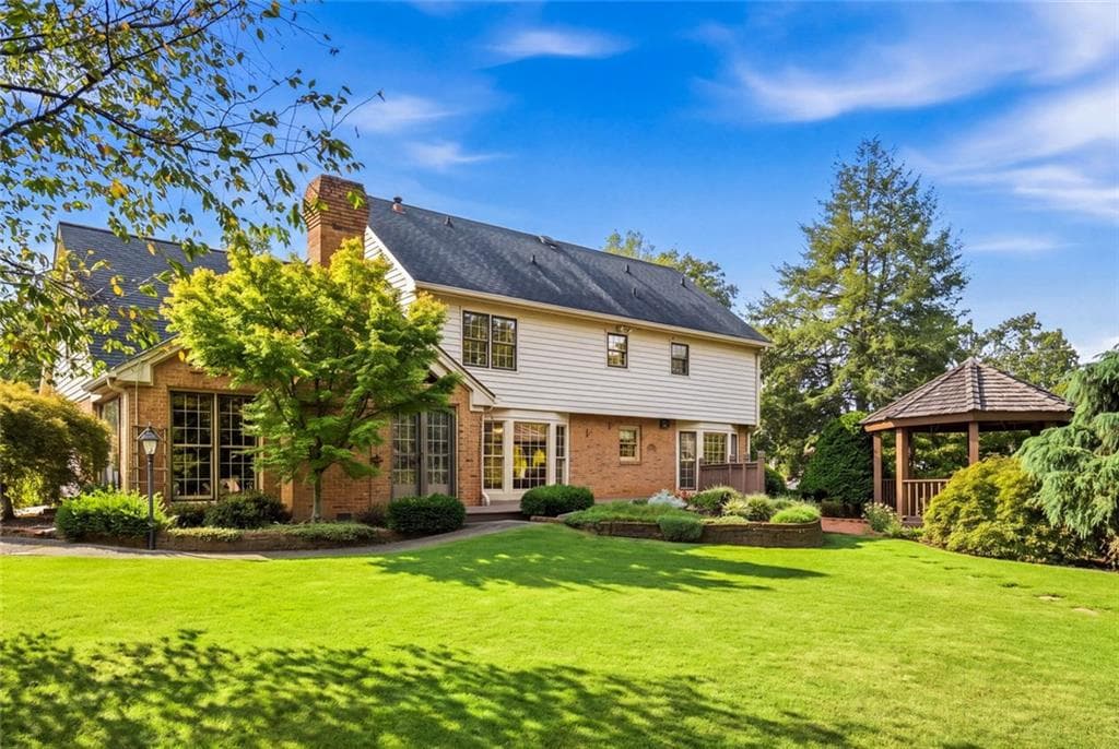 4 bedroom, 4 bathroom, 4,112 sq ft single family residence under contract at 4965 Trailridge Pass, Dunwoody, GA 30338 — photo 2