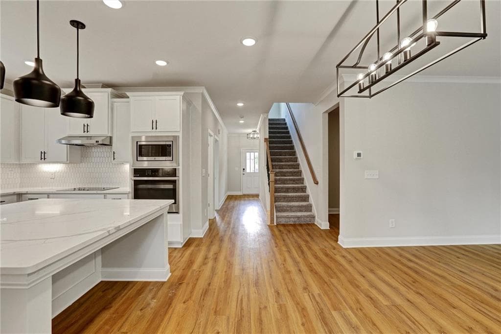 5 bedroom, 4 bathroom, 2,800 sq ft single family residence for sale at 3095 Zodiac Court, Lawrenceville, GA 30044 — photo 2