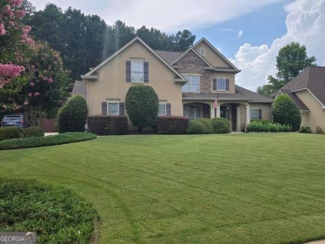 5 bedroom, 4 bathroom, 3,326 sq ft single family residence for sale at 1214 McAllistar Drive, Locust Grove, GA 30248
