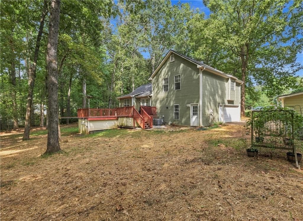 4 bedroom, 2 bathroom, 1,259 sq ft single family residence for sale at 96 Boxcar Way W, Dawsonville, GA 30534 — photo 4