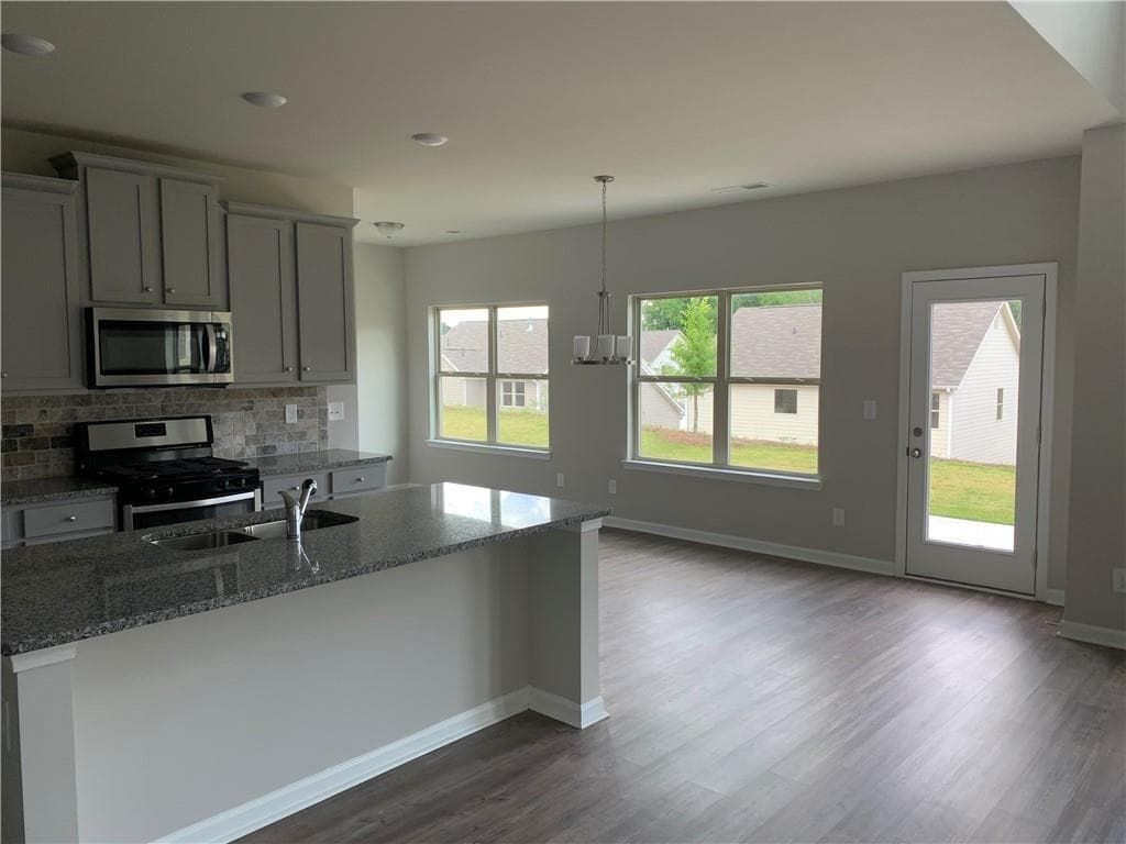 4 bedroom, 3 bathroom, 2,882 sq ft single family residence for sale at 2540 Bear Mountain Street, Lithonia, GA 30058 — photo 4