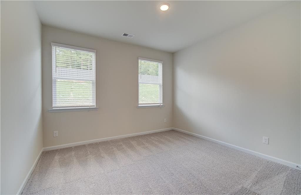 5 bedroom, 4 bathroom, 3,167 sq ft single family residence for sale at 1059 Georgian Point Drive, Lawrenceville, GA 30045 — photo 9