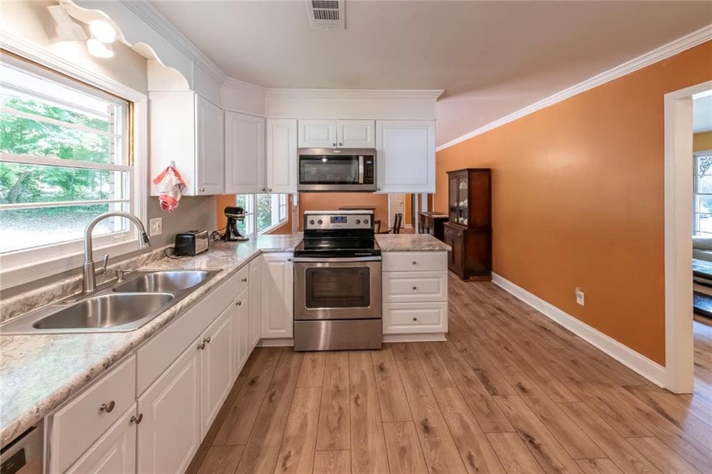 3 bedroom, 2 bathroom, 1,724 sq ft single family residence for sale at 211 Bennett Circle, Carrollton, GA 30117 — photo 7