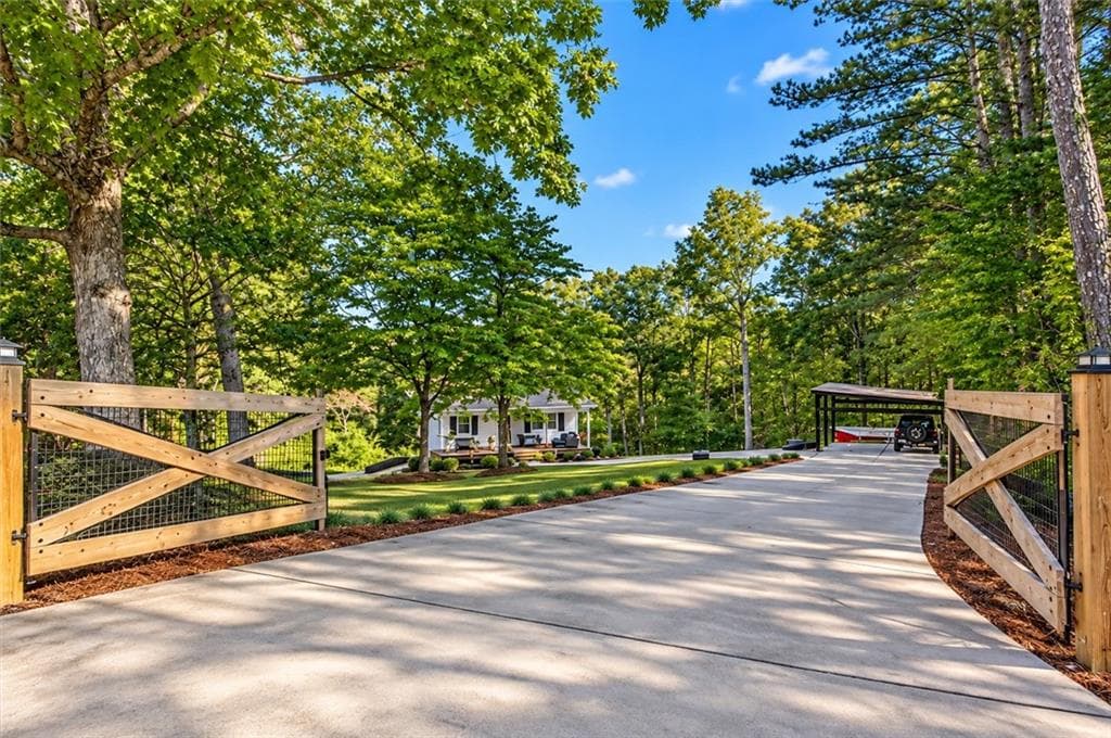 4 bedroom, 2 bathroom, 1,792 sq ft single family residence for sale at 1015 Shamrock Lane, Ball Ground, GA 30107 — photo 2