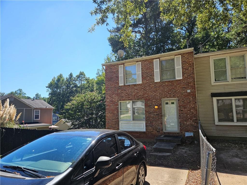 2 bedroom, 3 bathroom, 1,280 sq ft townhouse for sale at 5599 Marbut Road, Lithonia, GA 30058 — photo 1 of 14