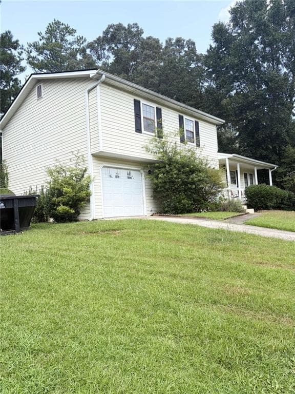 4 bedroom, 3 bathroom, 1,720 sq ft single family residence for sale at 7571 Kevin Pl, Jonesboro, GA 30236 — photo 2