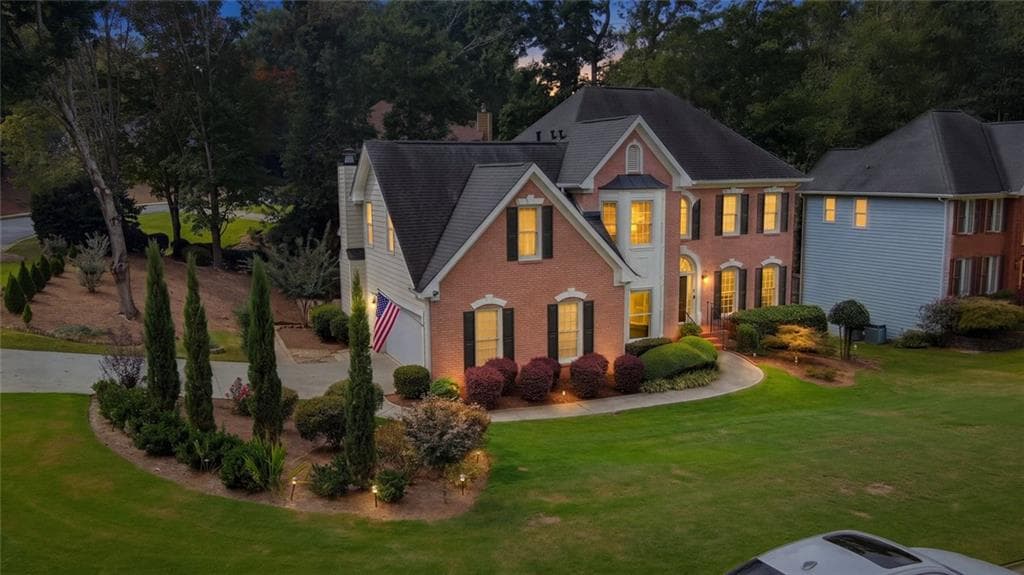 7 bedroom, 4 bathroom, 4,598 sq ft single family residence for sale at 1055 Whitehawk Trail, Lawrenceville, GA 30043 — photo 2