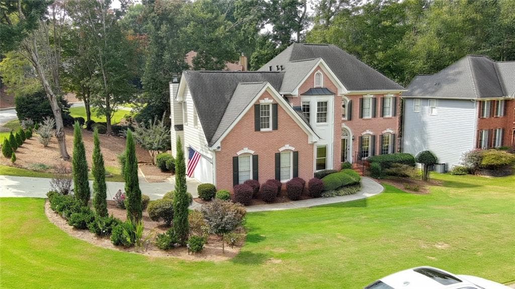 7 bedroom, 4 bathroom, 4,598 sq ft single family residence for sale at 1055 Whitehawk Trail, Lawrenceville, GA 30043 — photo 5