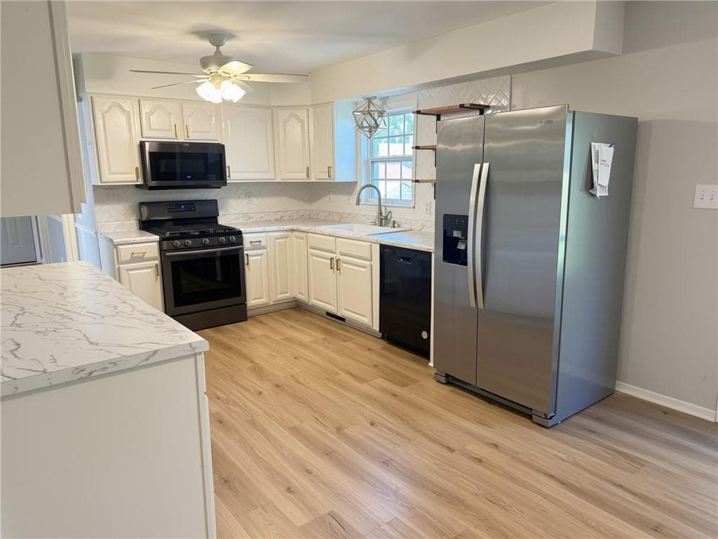 3 bedroom, 3 bathroom, 1,700 sq ft single family residence for sale at 7151 Curtis Drive, Macon, GA 31216 — photo 5