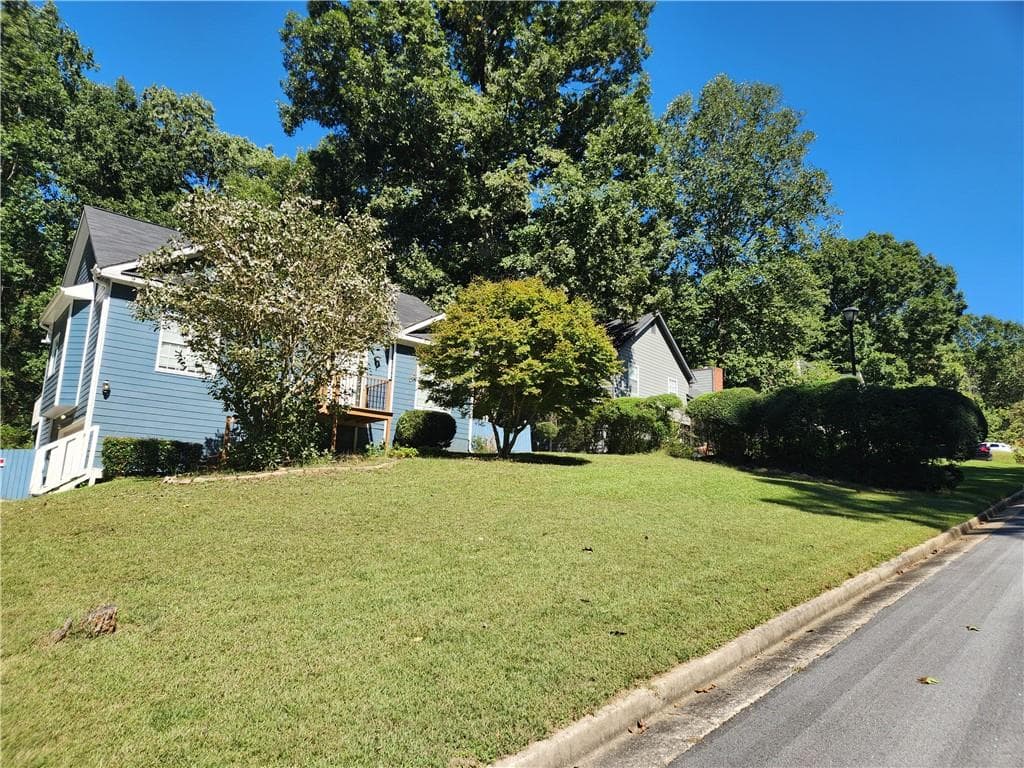 4 bedroom, 3 bathroom, 2,064 sq ft single family residence for sale at 5392 Terrytown Lane, Lithonia, GA 30038 — photo 2