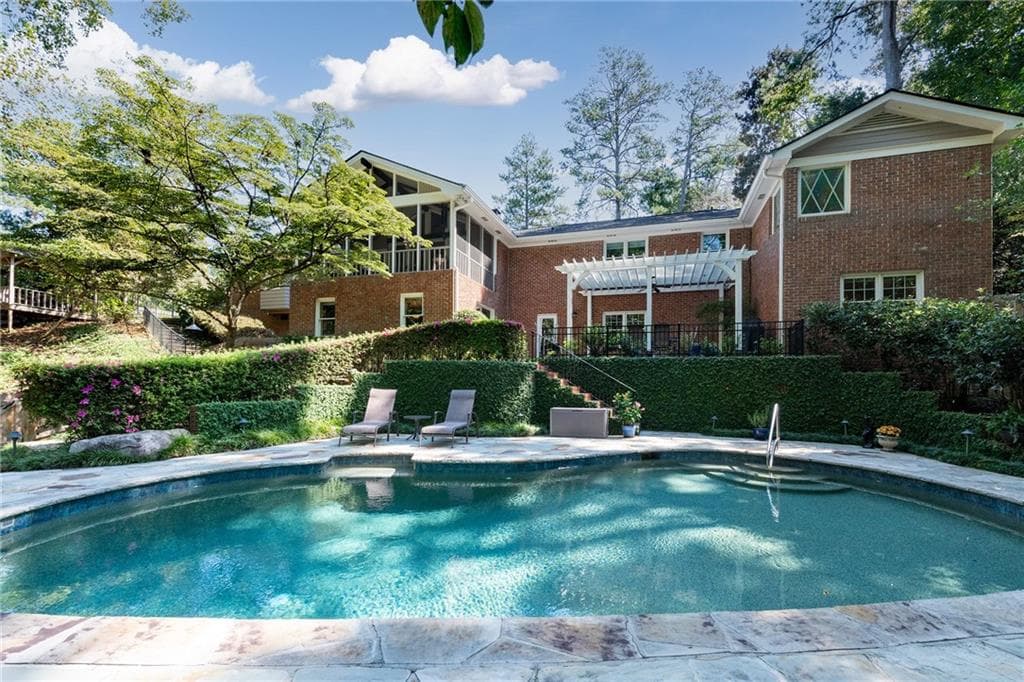 5 bedroom, 4 bathroom, 5,358 sq ft single family residence for sale at 5580 Lake Island Drive, Sandy Springs, GA 30327 — photo 2