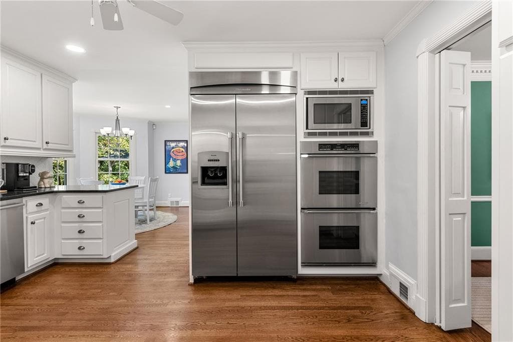 5 bedroom, 4 bathroom, 5,358 sq ft single family residence for sale at 5580 Lake Island Drive, Sandy Springs, GA 30327 — photo 10