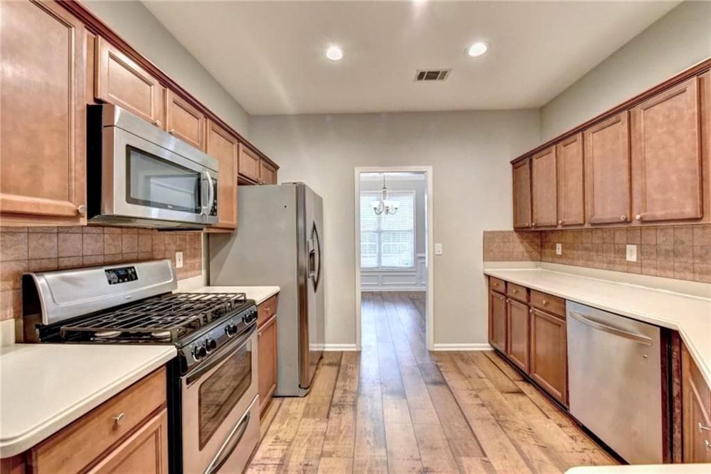 5 bedroom, 3 bathroom, 2,470 sq ft single family residence for rent at 410 Ruby Forest Parkway, Suwanee, GA 30024 for $2,800 a month — photo 4