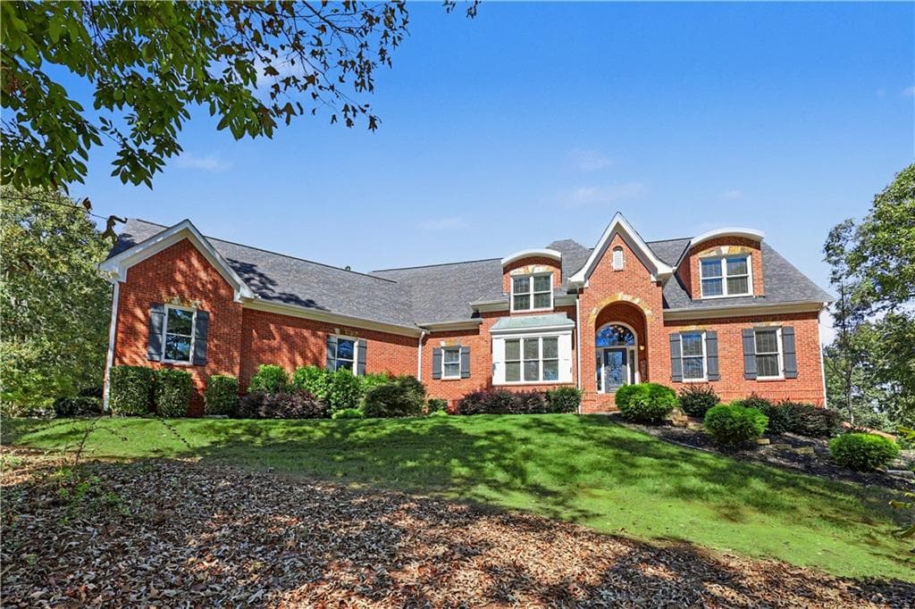7 bedroom, 6 bathroom, 7,650 sq ft single family residence for sale at 8415 Glen Lake Drive, Cumming, GA 30028