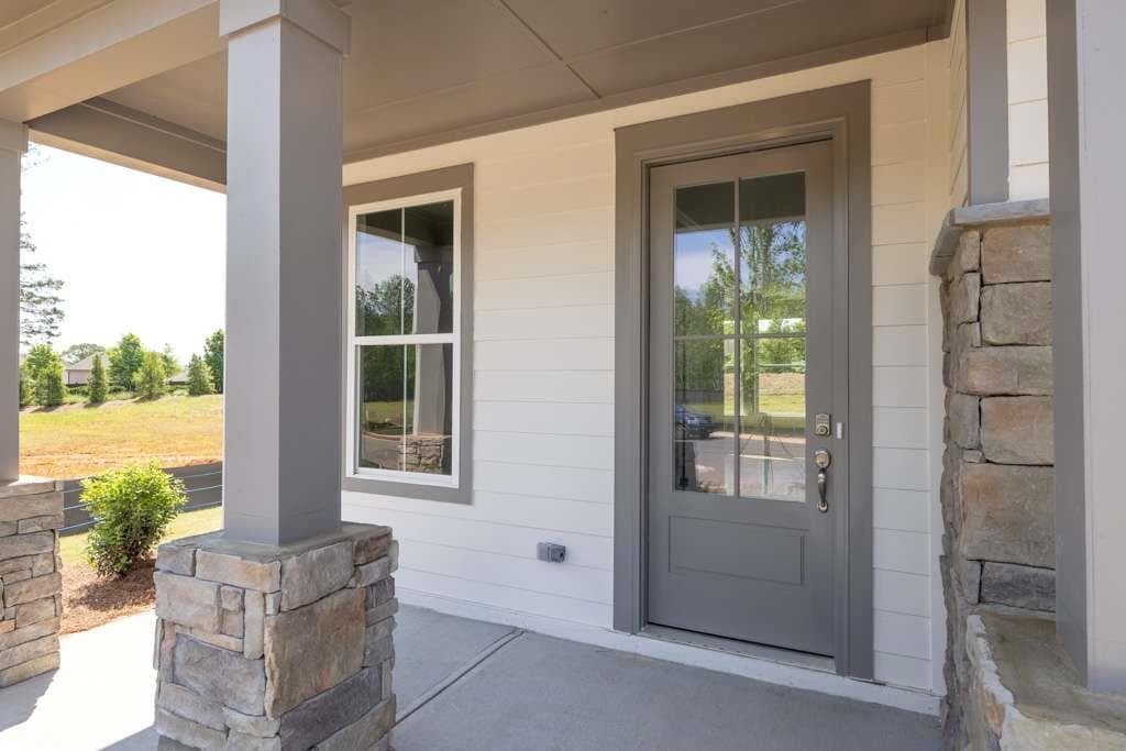 4 bedroom, 3 bathroom, 2,228 sq ft single family residence for sale at 84 Hickory Grove Lane, Hoschton, GA 30548 — photo 3