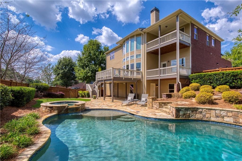 5 bedroom, 4 bathroom, 5,360 sq ft single family residence for sale at 11001 Estates Circle, Alpharetta, GA 30022 — photo 2
