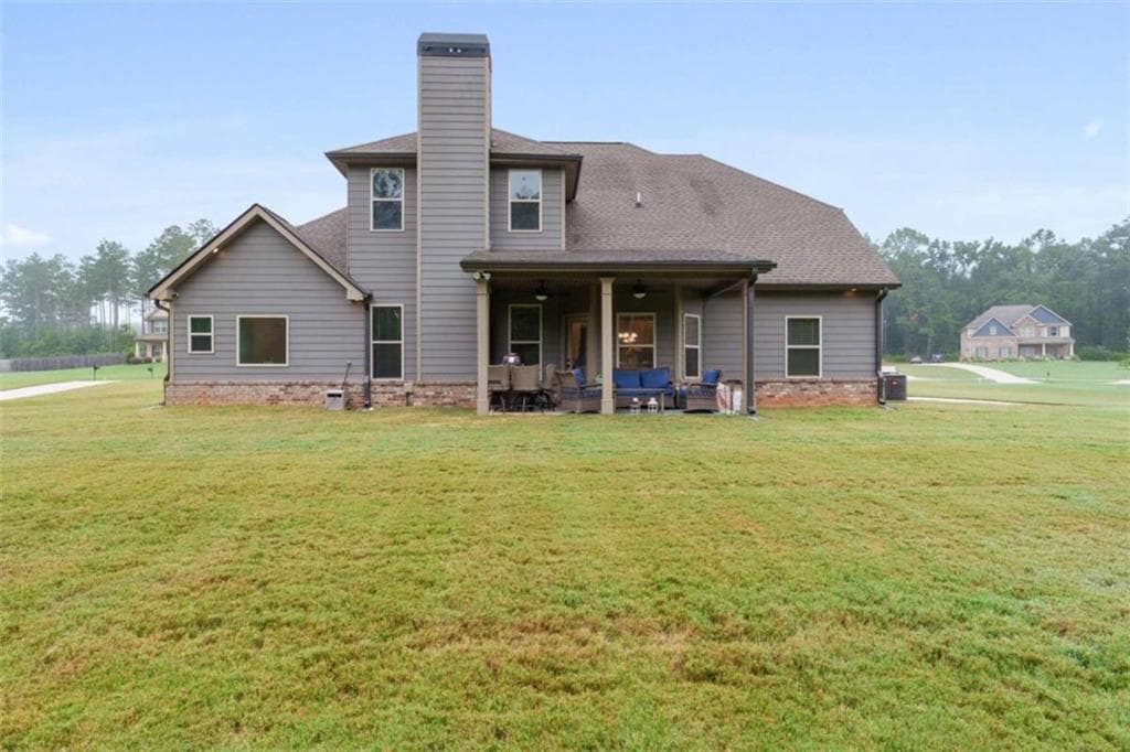 5 bedroom, 4 bathroom, 3,200 sq ft single family residence for sale at 90 Timber Drive, Forsyth, GA 31029 — photo 2